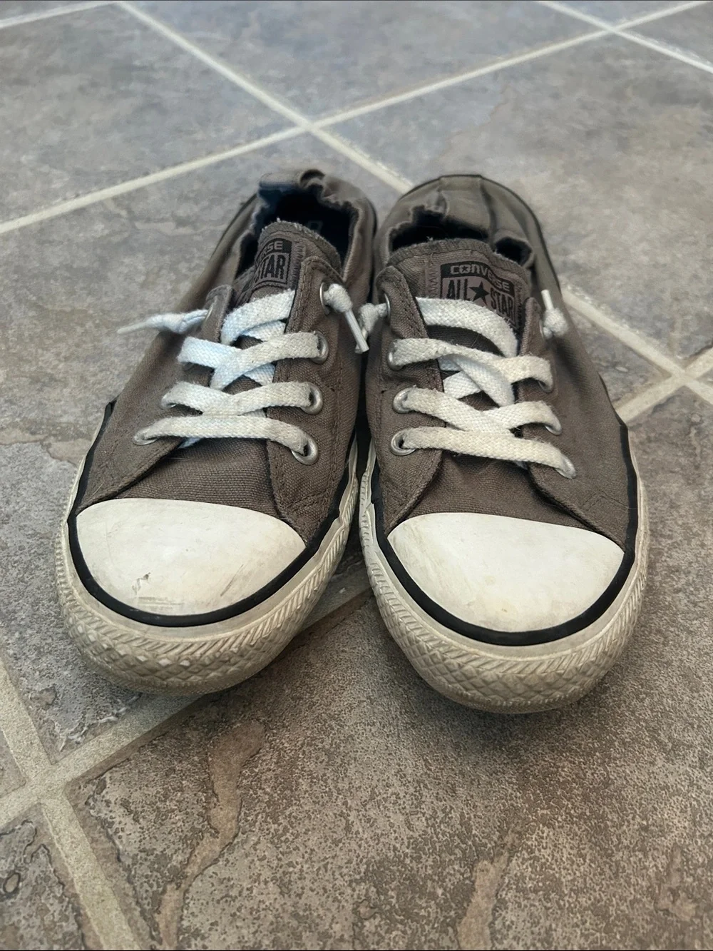 Converse women’s Low-Top Sneakers in Brown with White Trim